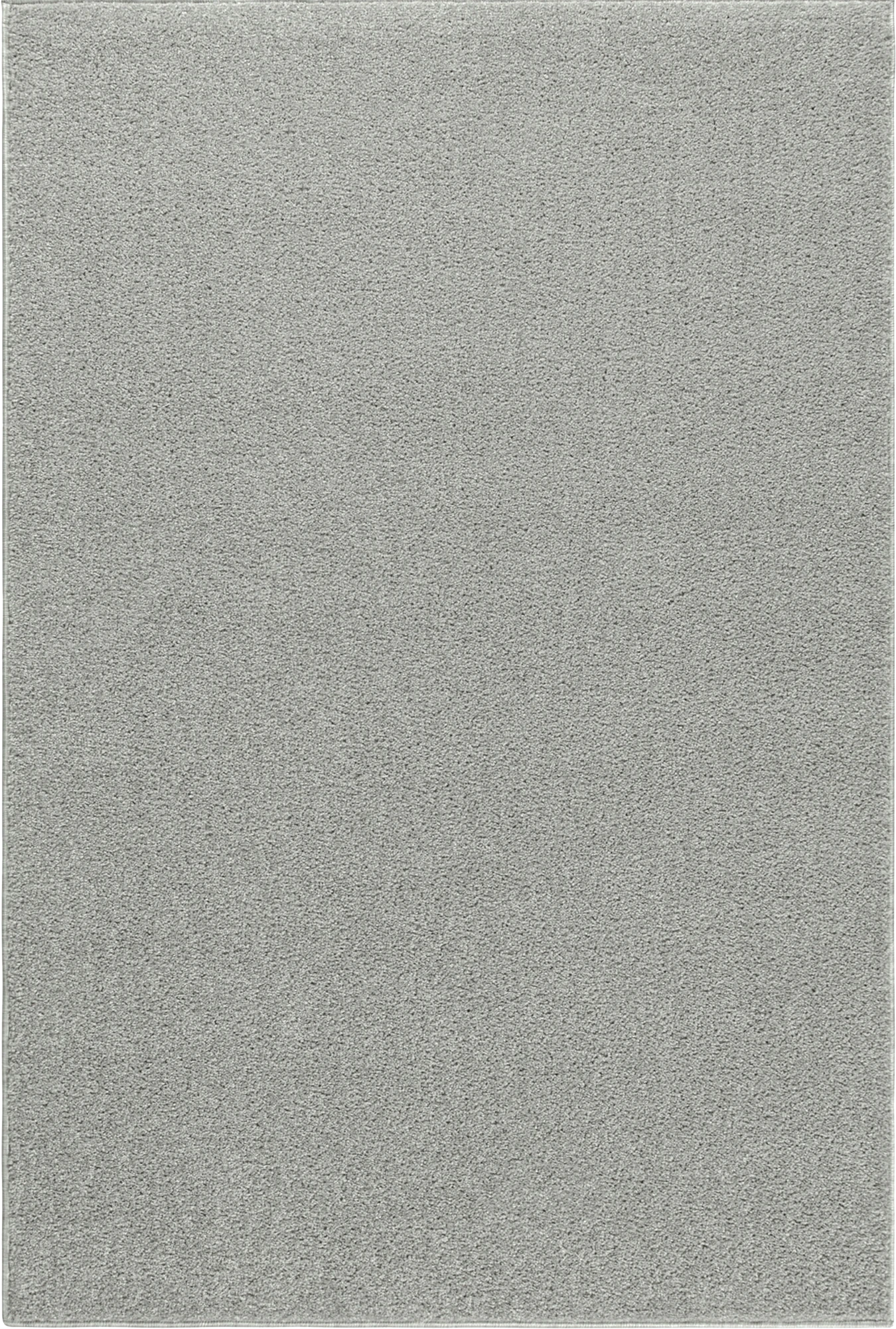 Einfarbiger cremefarbener Plüschteppich