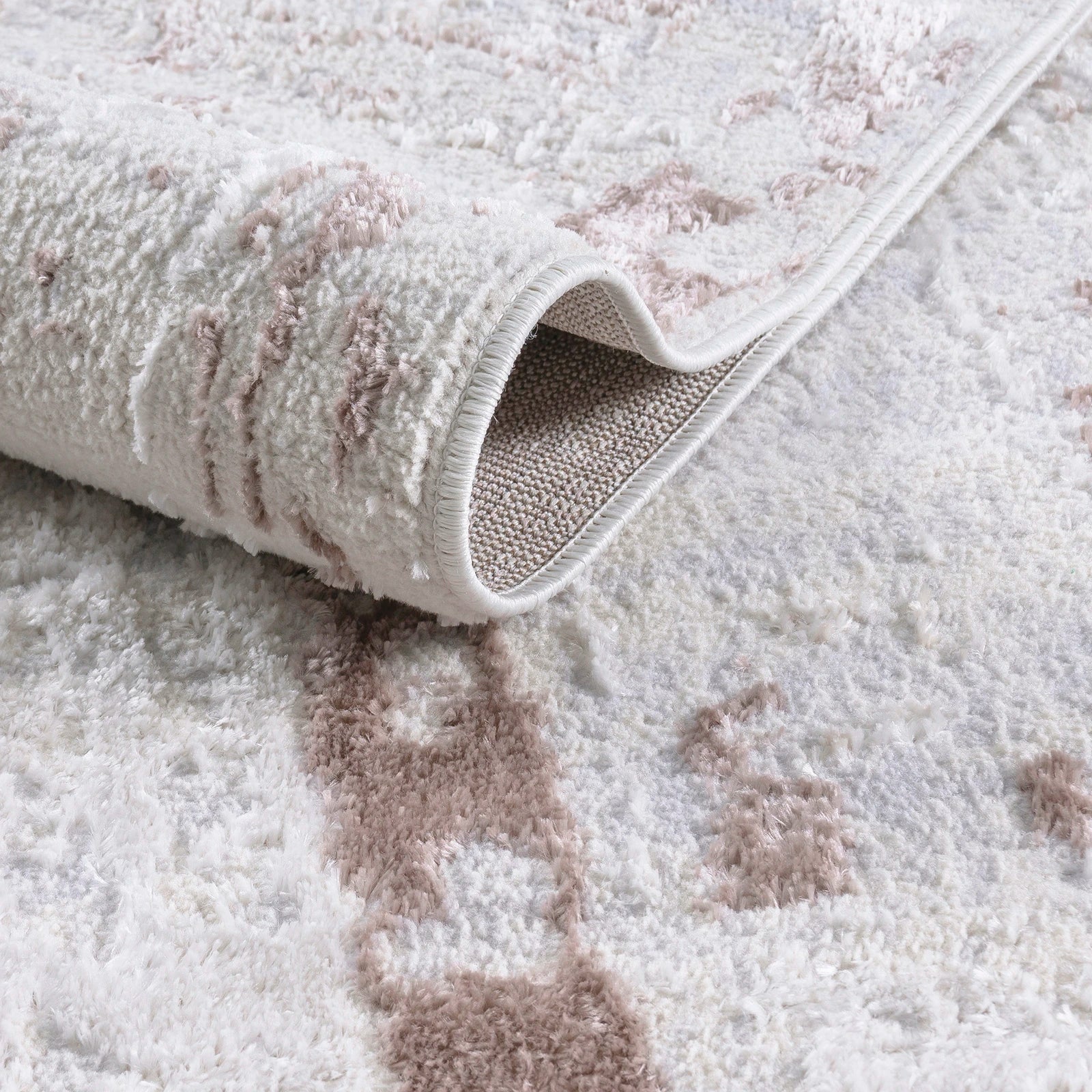 Teppich Urban Drift in Braun mit abstraktem Muster