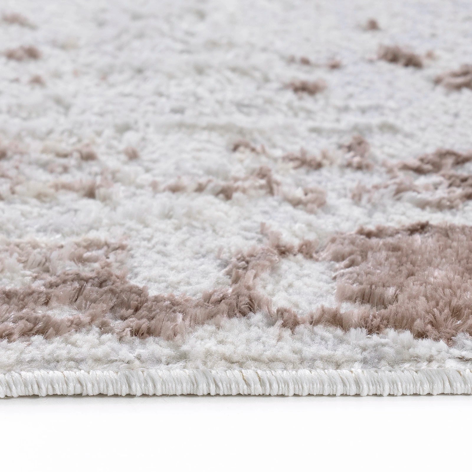 Teppich Urban Drift in Braun mit abstraktem Muster