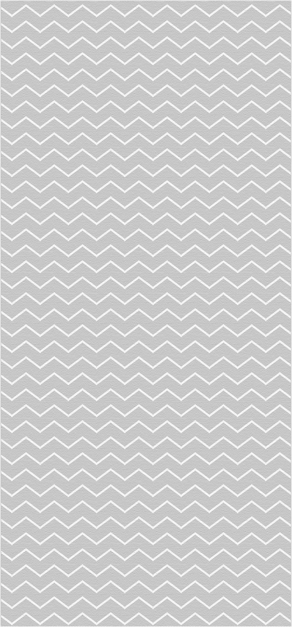 Grauer Teppich mit weißem Chevron-Zickzackmuster
