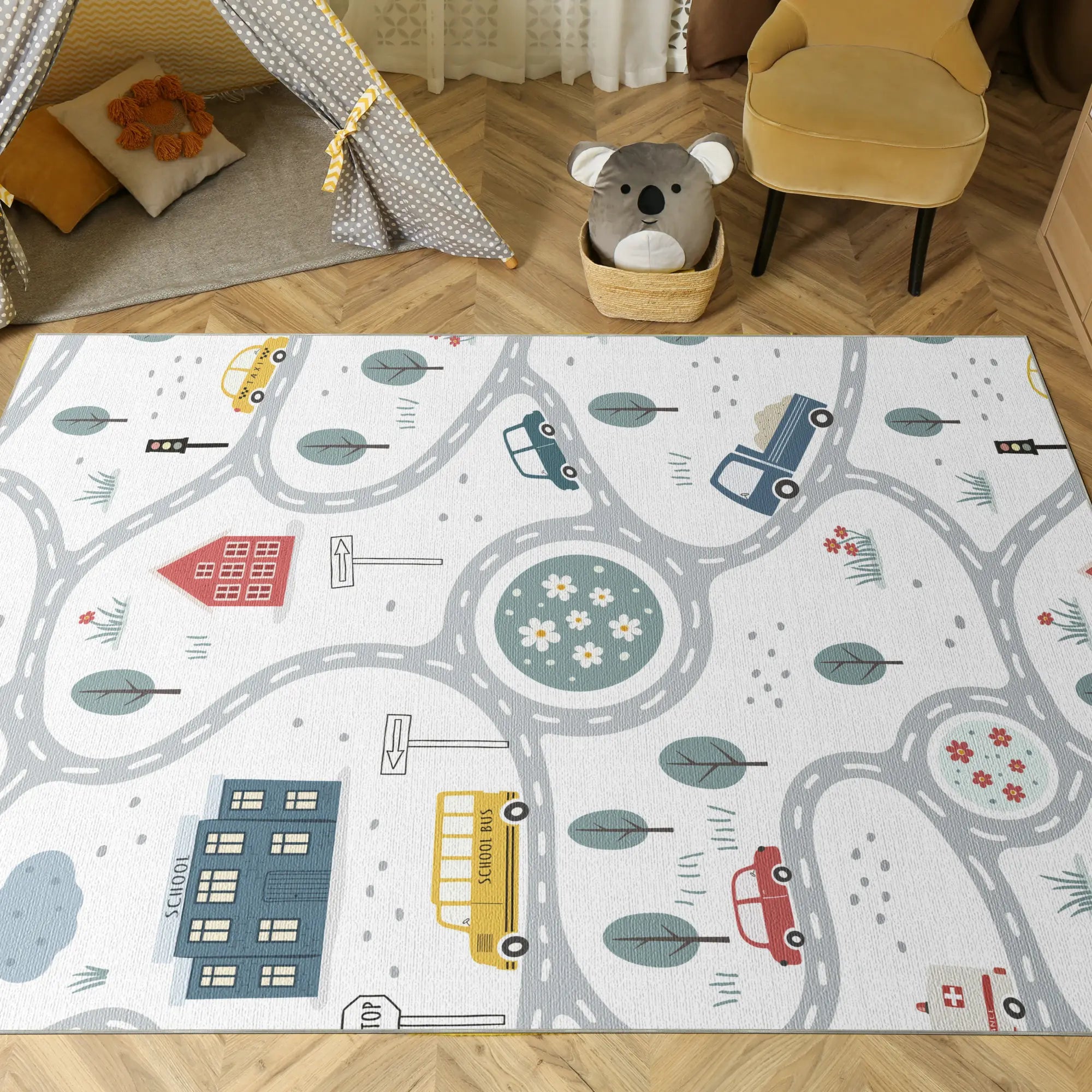 Kinder-Spielteppich mit Straßen- und Fahrzeugmuster auf einem Holzboden.