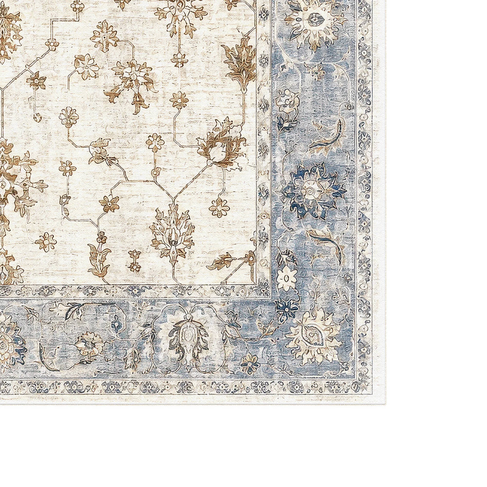 A close-up of an area rug showing its corner, featuring a distressed cream field with tan floral motifs and a dusty blue border with cream detailing.