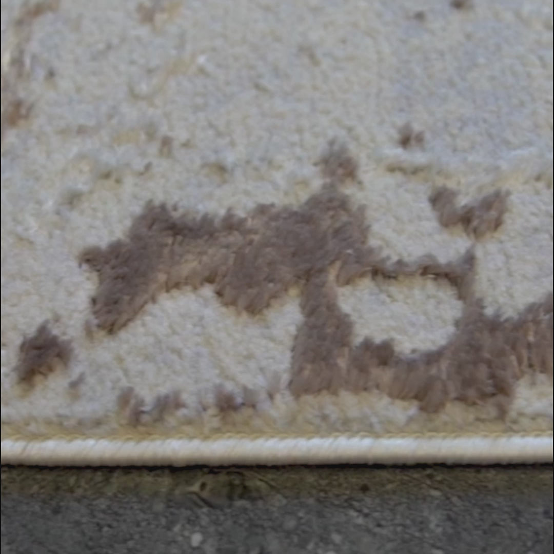 Teppich Urban Drift in Braun mit abstraktem Muster